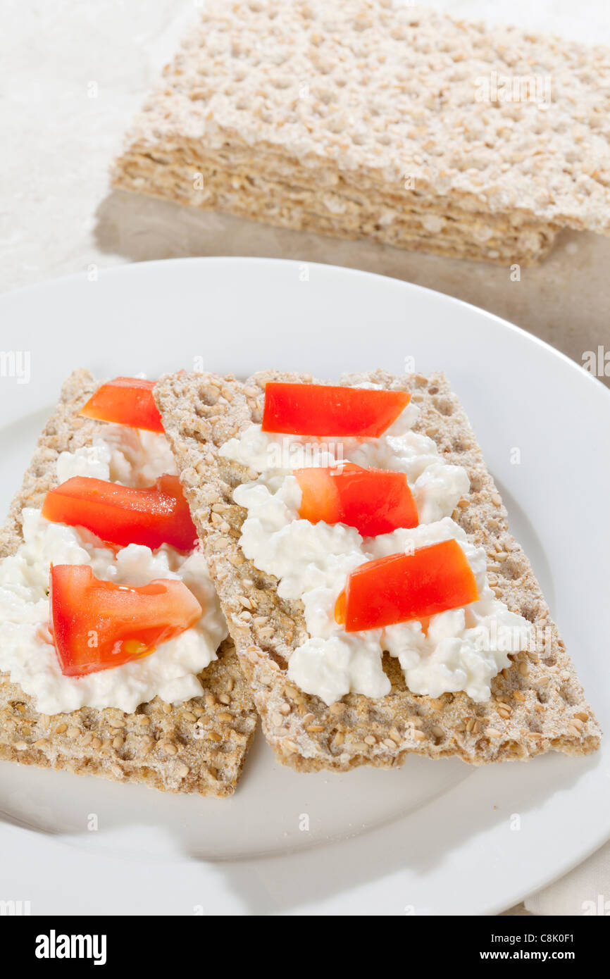 Ryvita Crispbread with cottage cheese and tomato Stock Photo Alamy