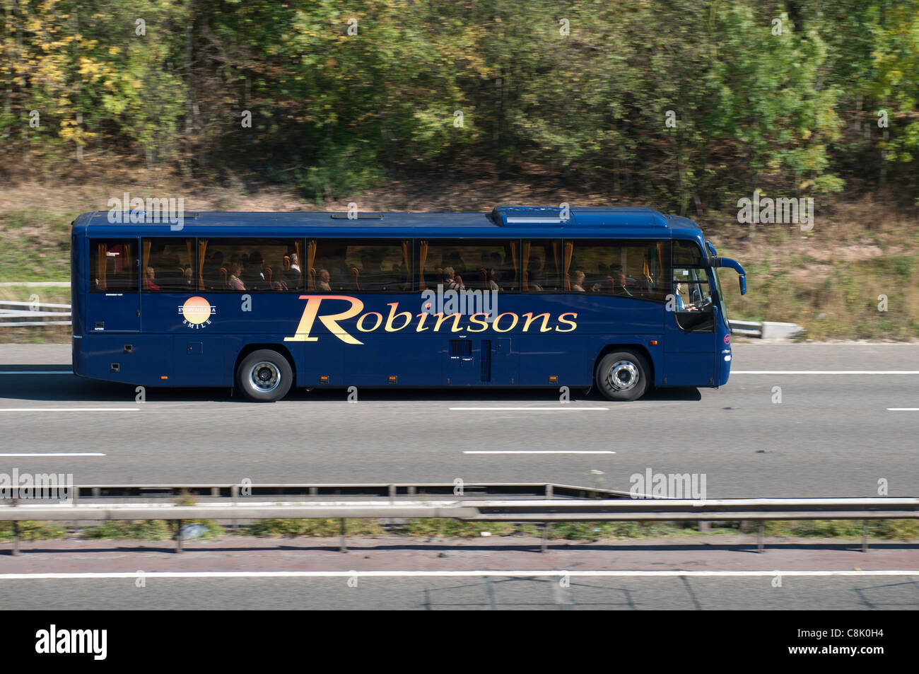 Robinsons coach on M40 motorway, Warwickshire, UK Stock Photo