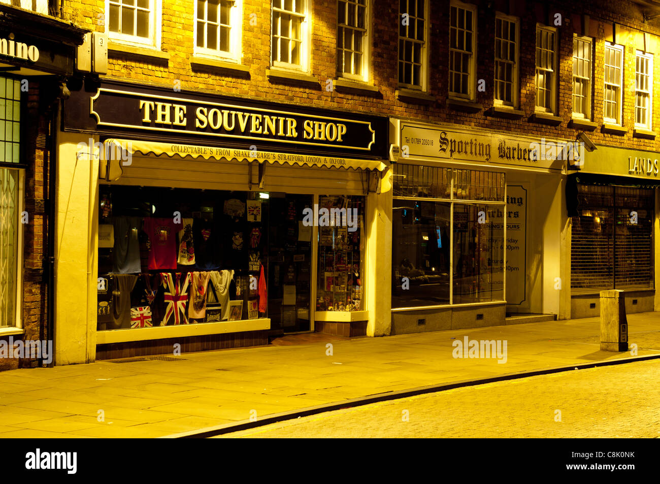 Shops at night in Henley Street, Stratford-upon-Avon, England, UK Stock Photo