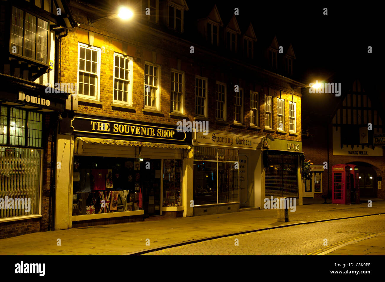 Shops at night in Henley Street, Stratford-upon-Avon, England, UK Stock Photo