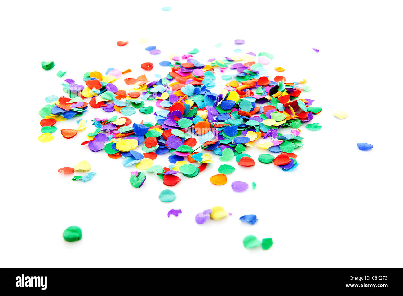 pile of colorful confetti over white background Stock Photo - Alamy