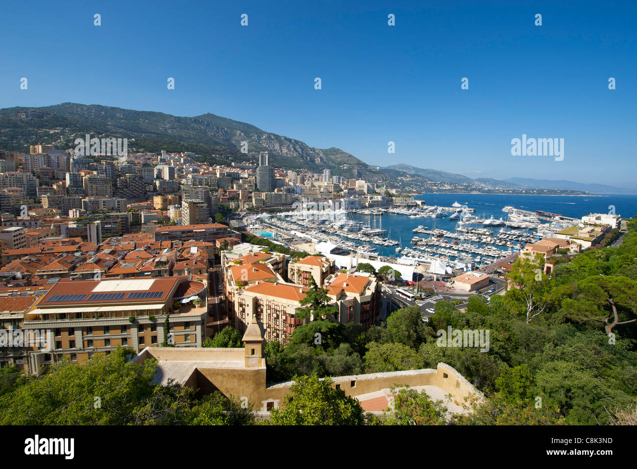View of Port Hercule and the city and Principality of Monaco on the French Riviera along the Mediterranean coast. Stock Photo