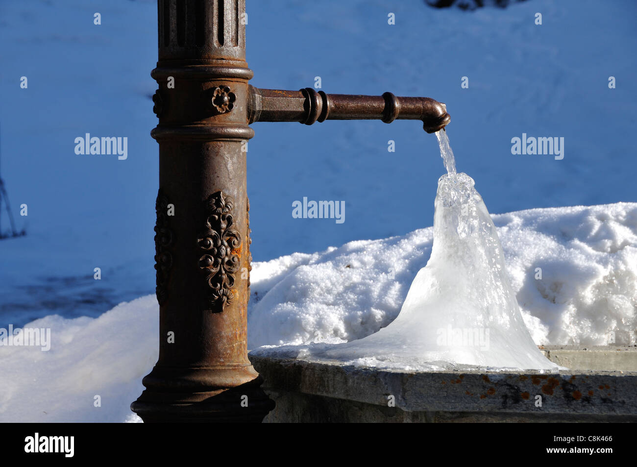 Frozen Fountain, Zernez, Lower Engadin, Graubünden, Switzerland Stock Photo