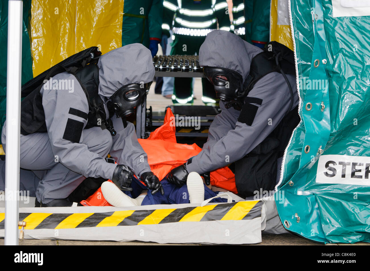 Paramedics demonstrate the decontamination procedure during the launch of Northern Ireland Ambulance Service (NIAS) Hazardous Area Response Team (HART). Stock Photo