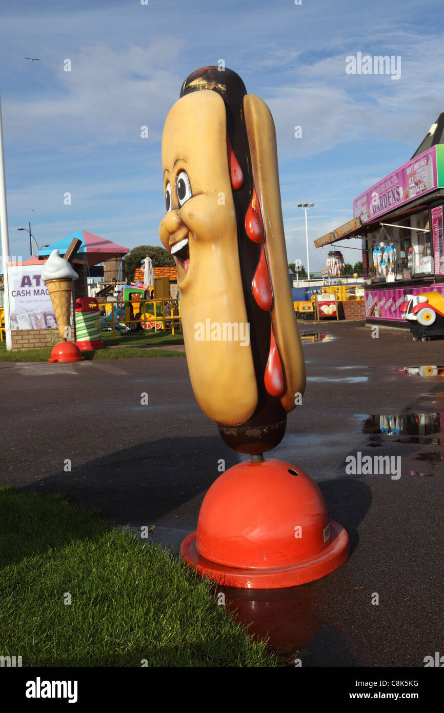 Large plastic hot dog, advertising availability of various junk food snacks at the British Seaside, Great Yarmouth, UK Stock Photo