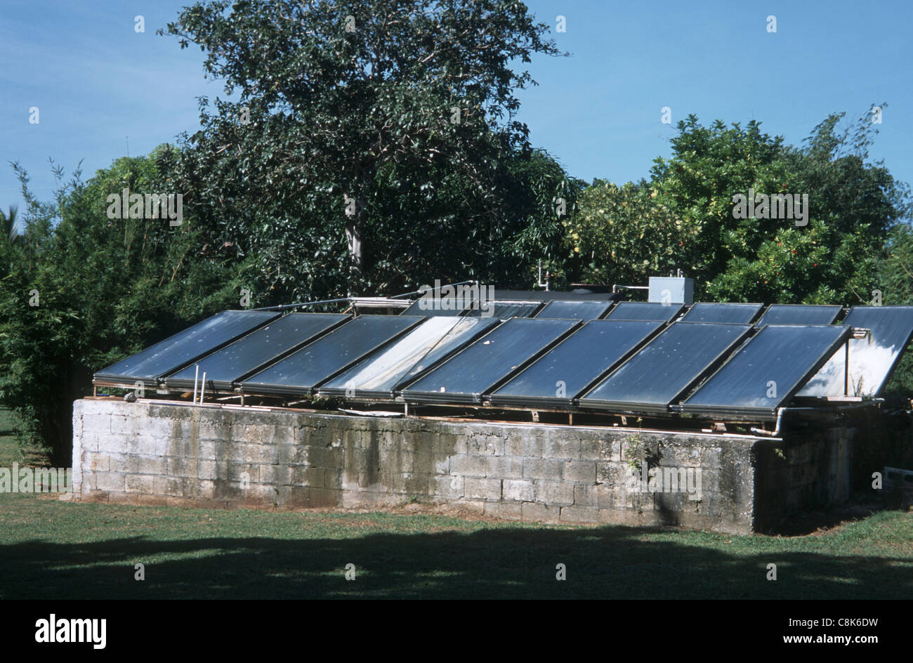 Negril, Jamaica. Solar water heating panels at a tourist hotel. Stock Photo