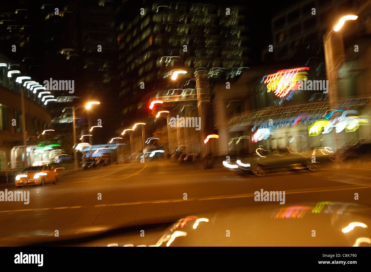 Blurry night city lights from a car while driving Stock Photo Alamy