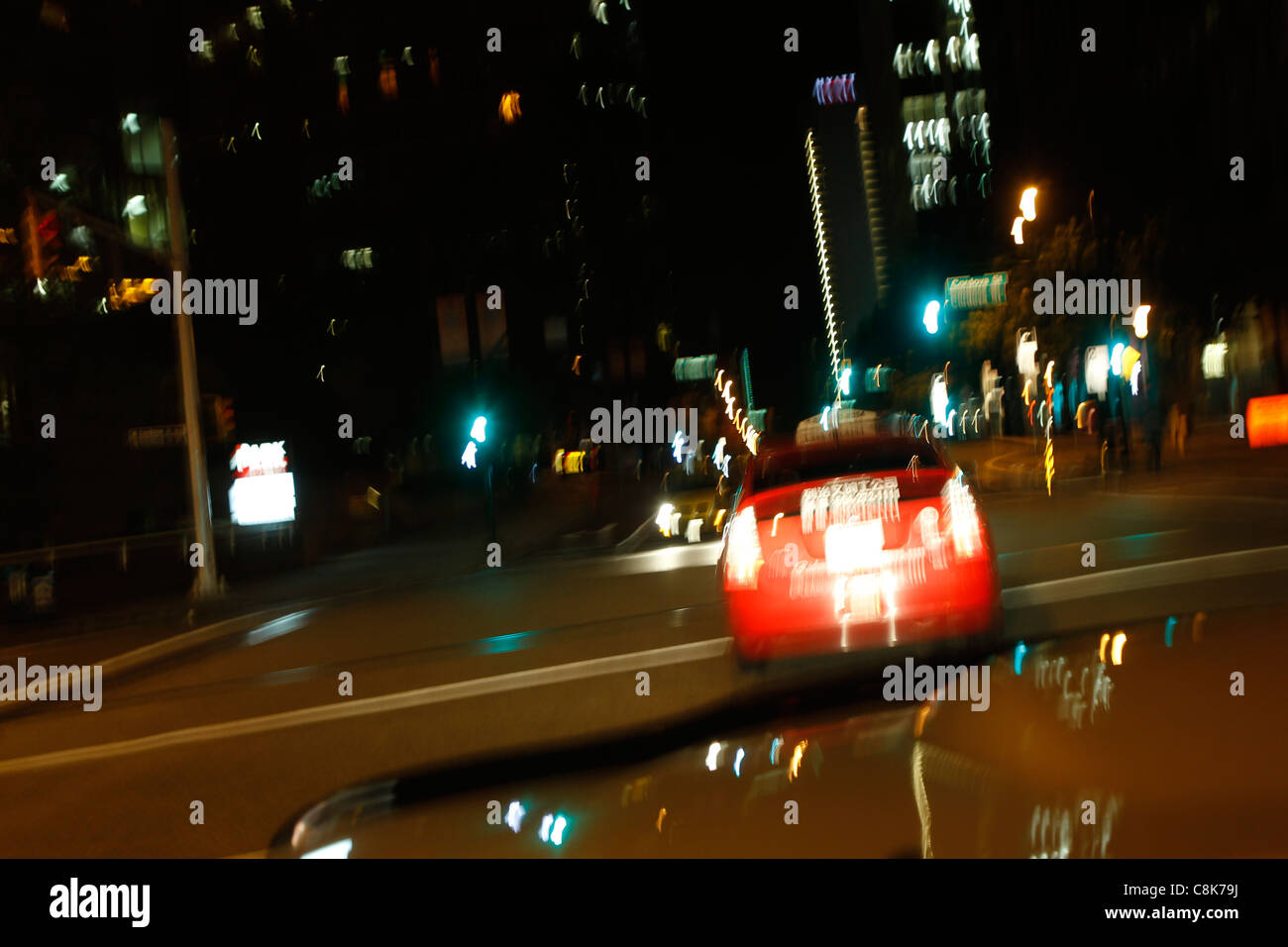 Blurry night city lights from a car while driving Stock Photo Alamy