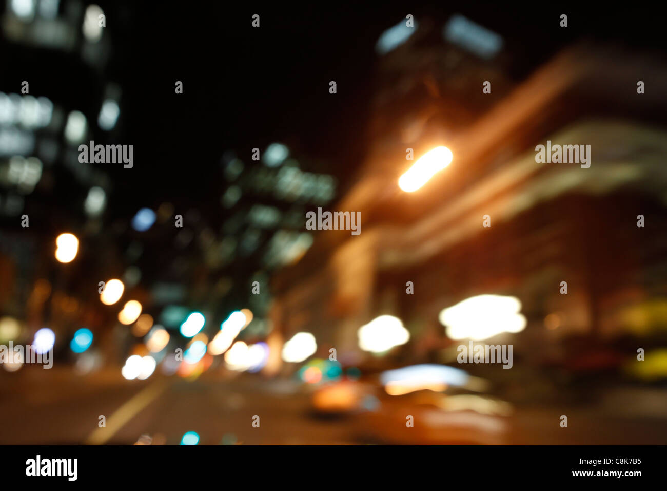 Blurry night city lights from a car while driving Stock Photo Alamy