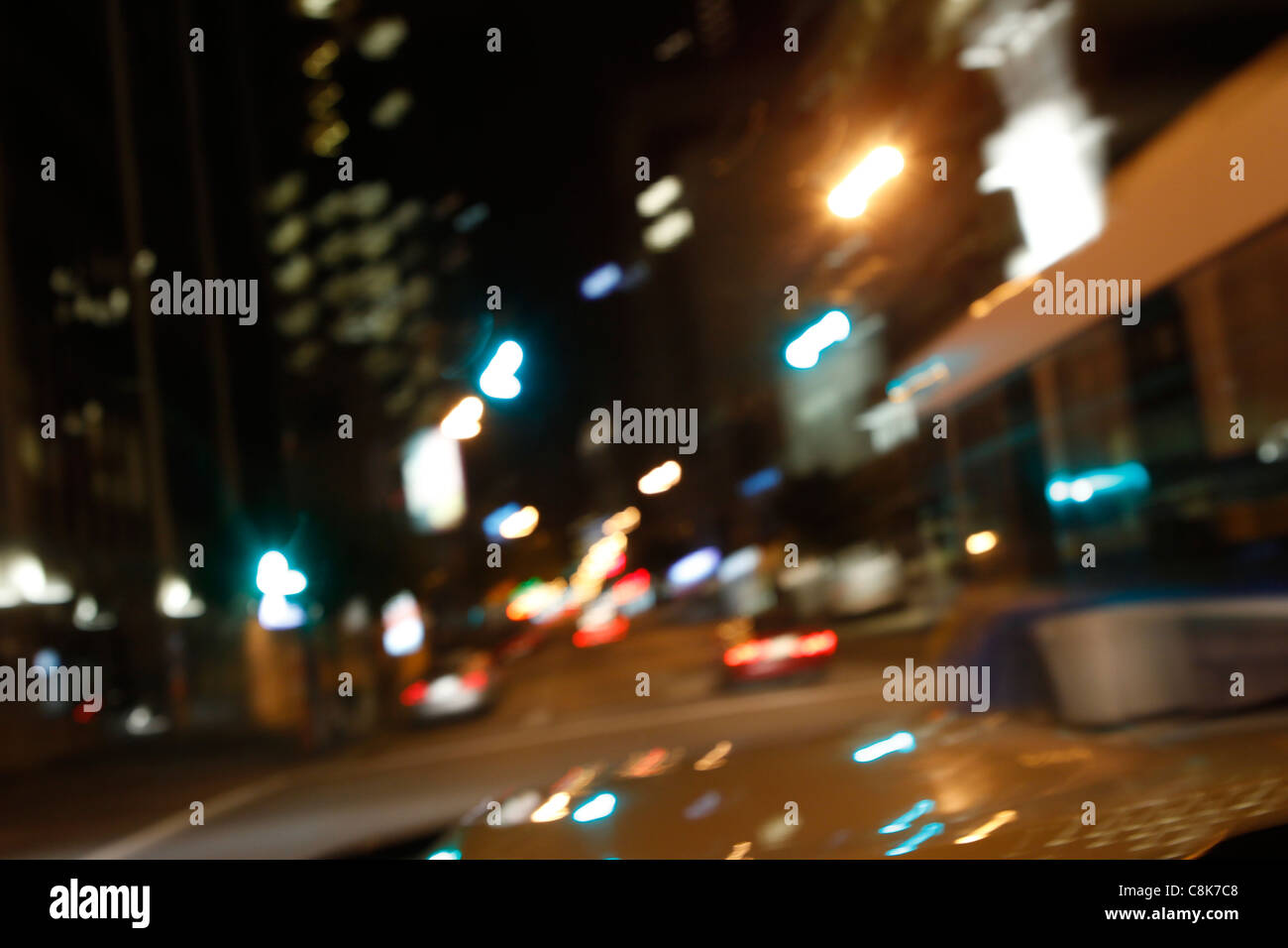 Blurry night city lights from a car while driving Stock Photo Alamy