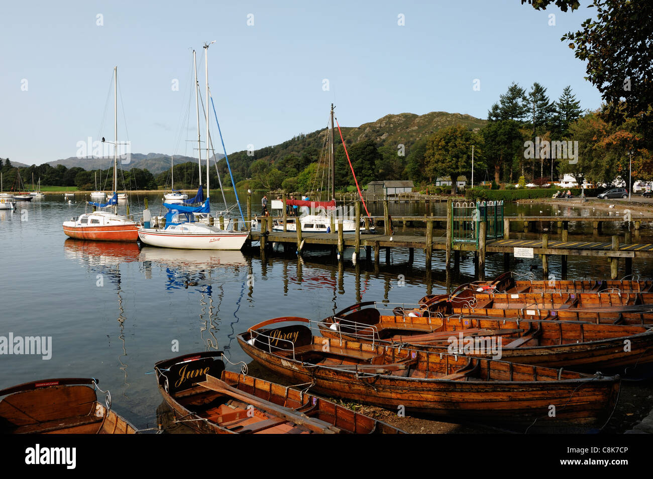 Boats and jetties at Waterhead Ambleside Lake District Stock Photo