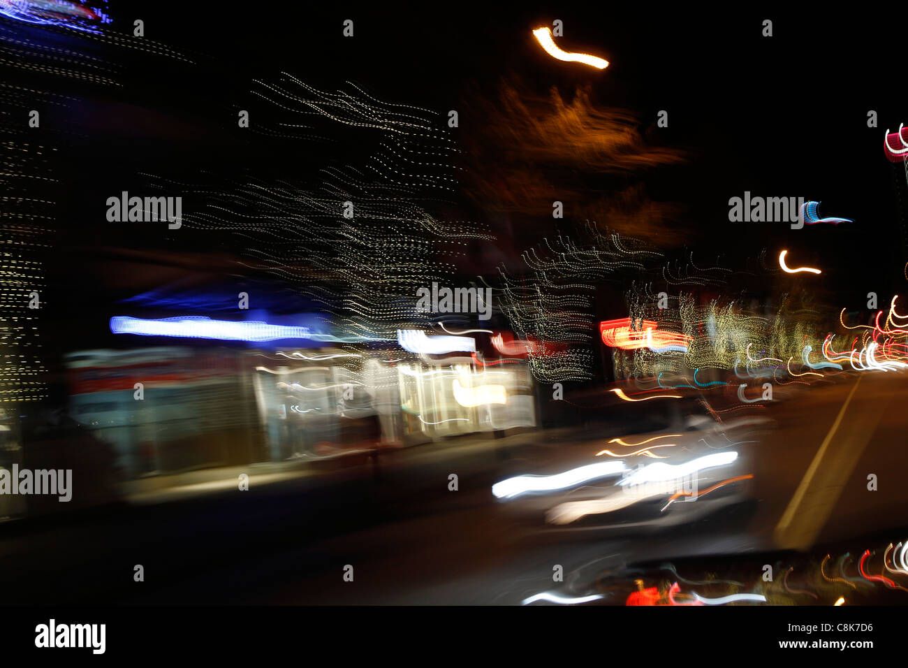Blurry night city lights from a car while driving Stock Photo Alamy