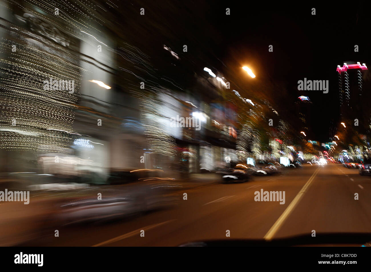 Blurry night city lights from a car while driving Stock Photo Alamy