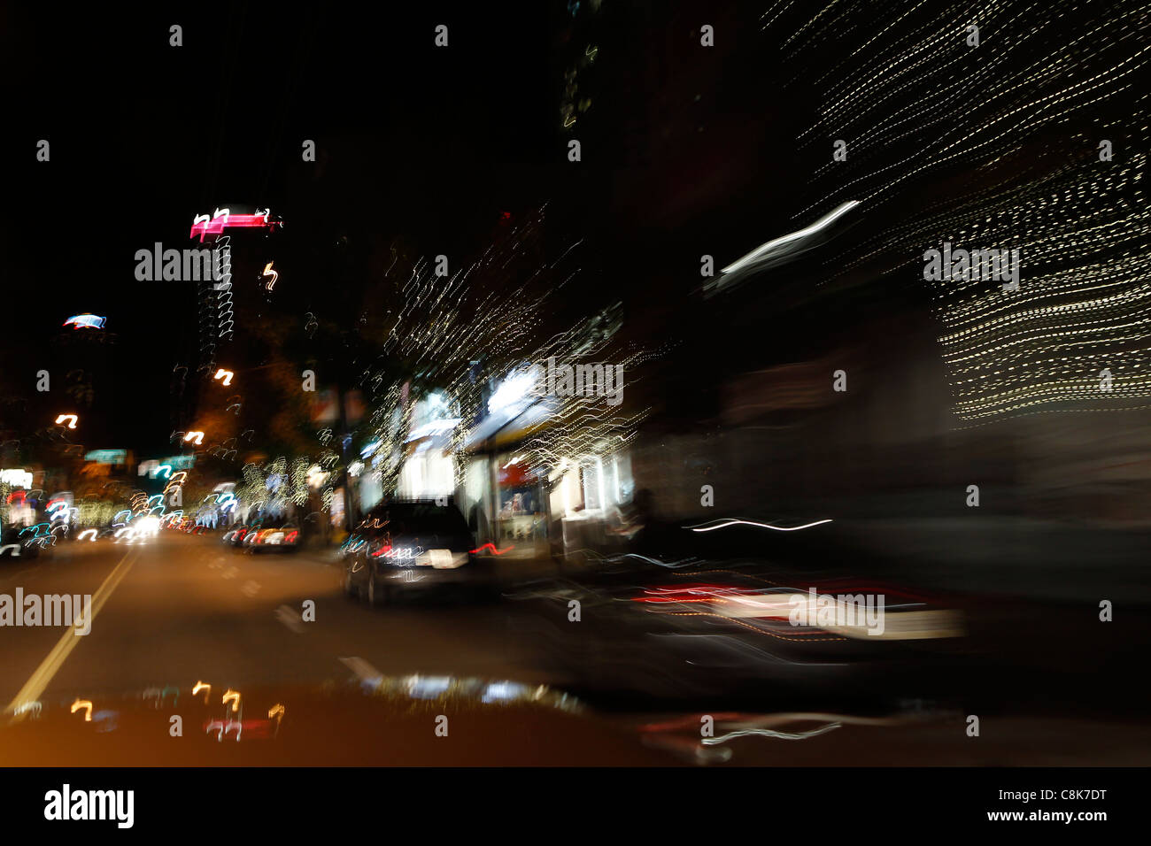 Blurry night city lights from a car while driving Stock Photo Alamy