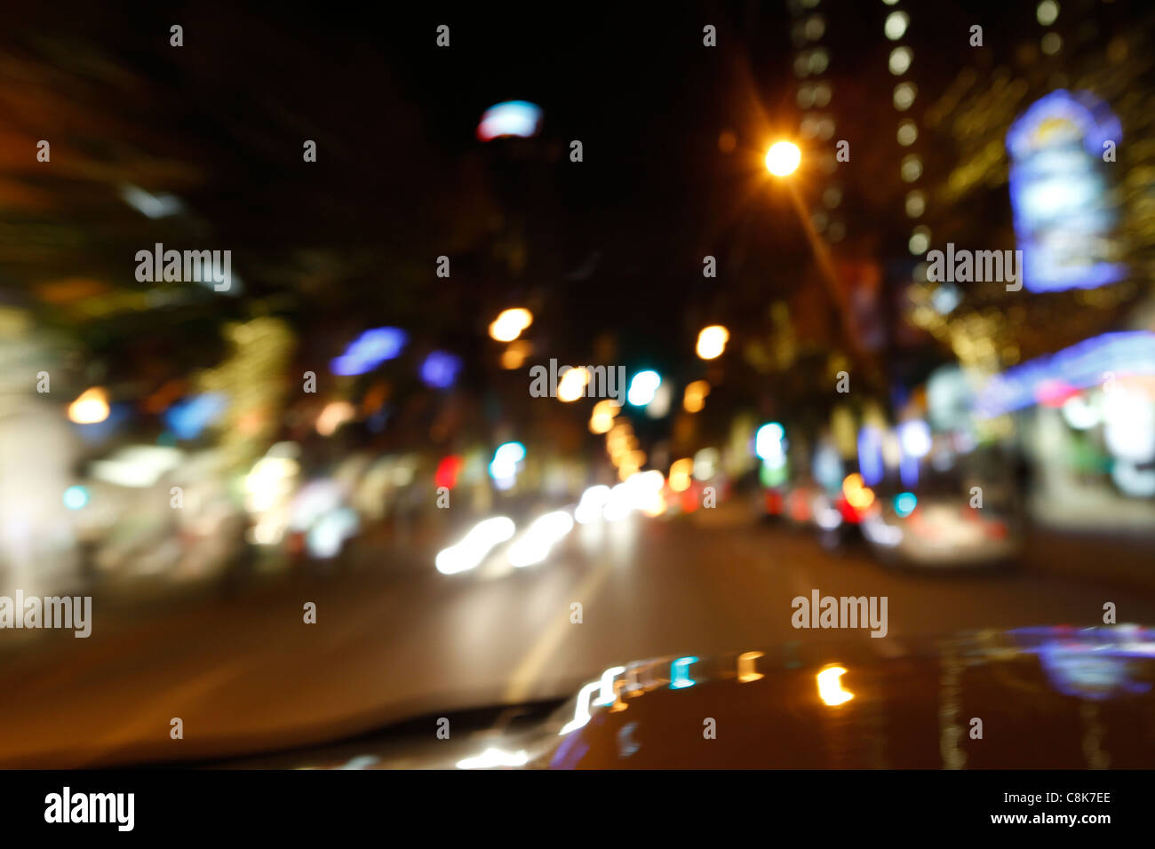 Blurry night city lights from a car while driving Stock Photo Alamy