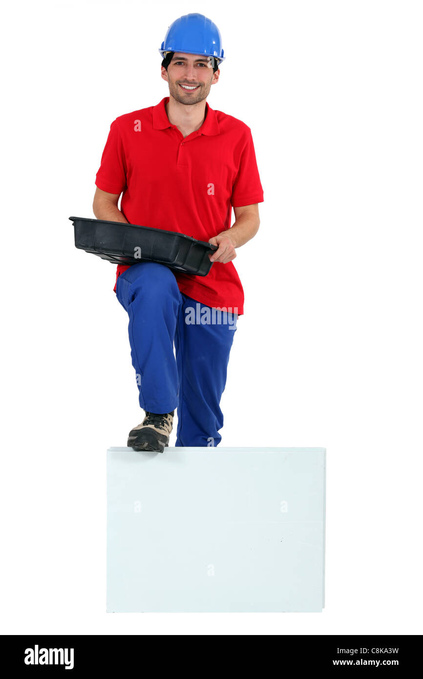 Man with bucket Stock Photo - Alamy