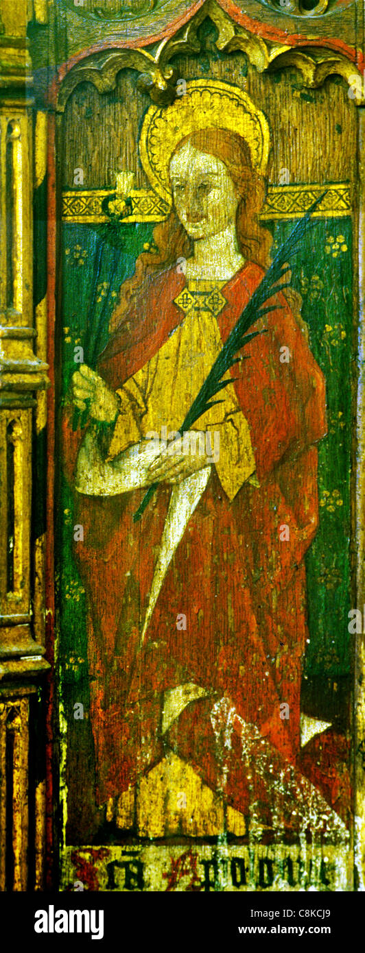 Ludham, Norfolk, rood screen, St. Apollonia, holding pincers and tooth, patron saint of dentists male saint saints English Stock Photo
