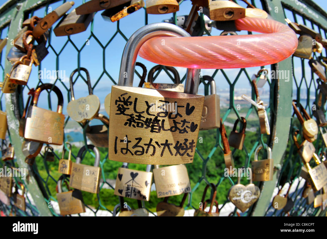 Padlocks on fence in japan, symbol of love Stock Photo