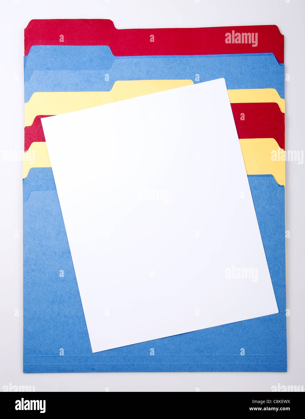 Blank Paper on Colored Folders Stock Photo