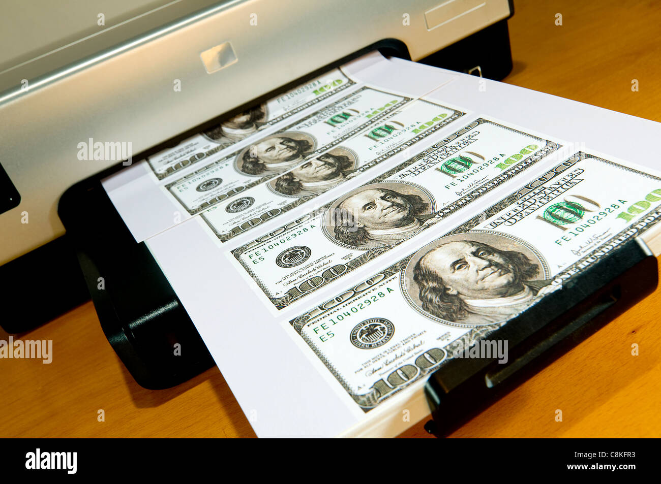 Money Printing on a Home Printer. Stock Photo