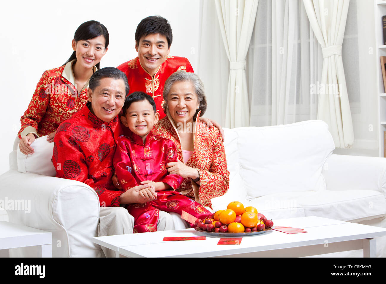 Family Celebrating Chinese New Year portrait Stock Photo - Alamy