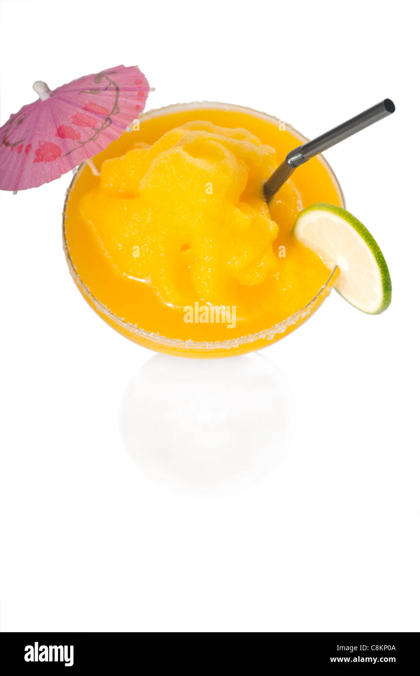 frozen mango margarita daiquiri with lime black straw and pink umbrella isolated on white background Stock Photo