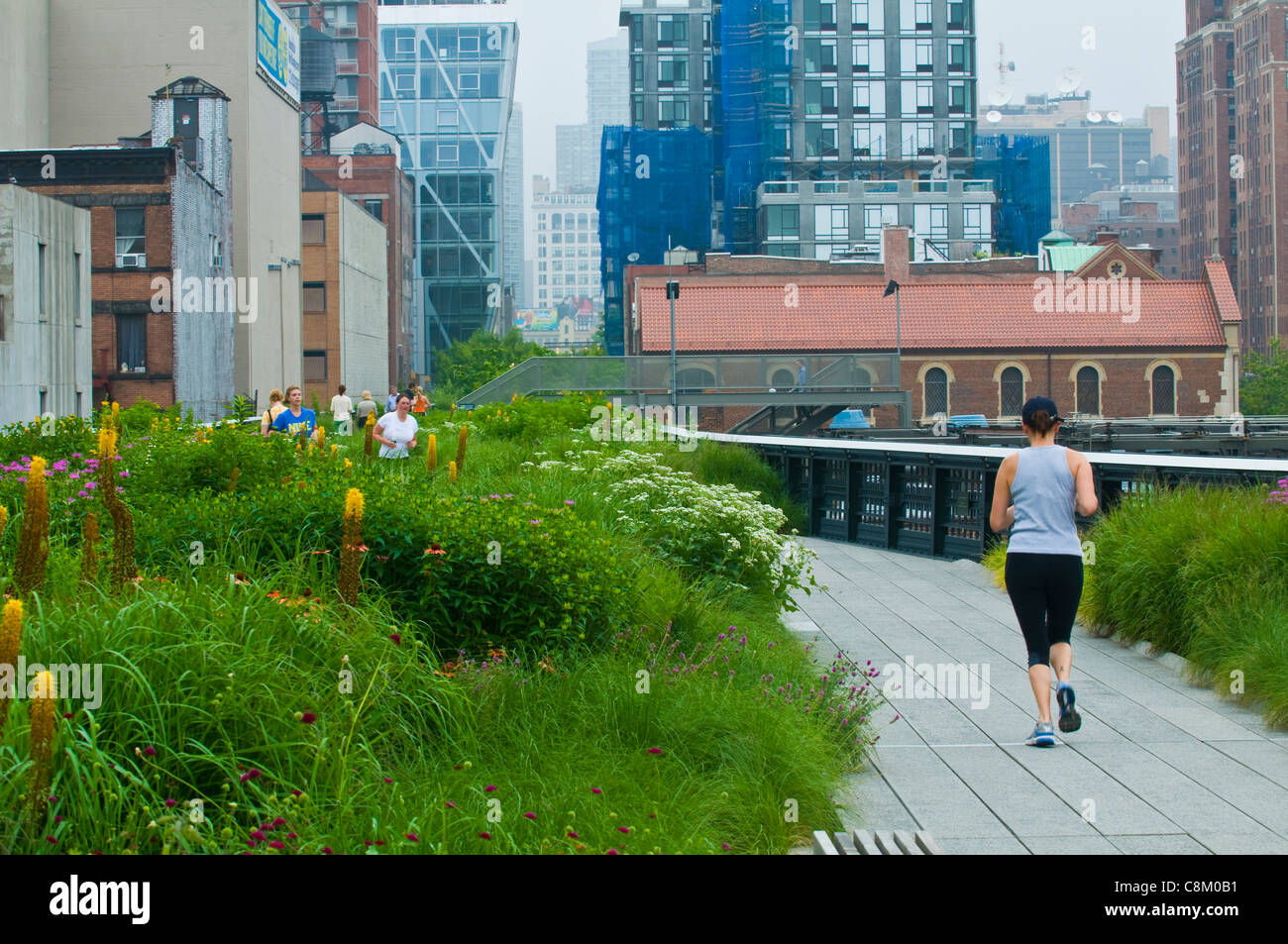 people jog through the High line park in Manhattan New York city Stock ...