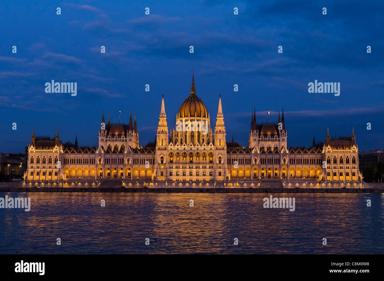 River Danube and the Hungarian Parliament Building in Budapest at Night Stock Photo