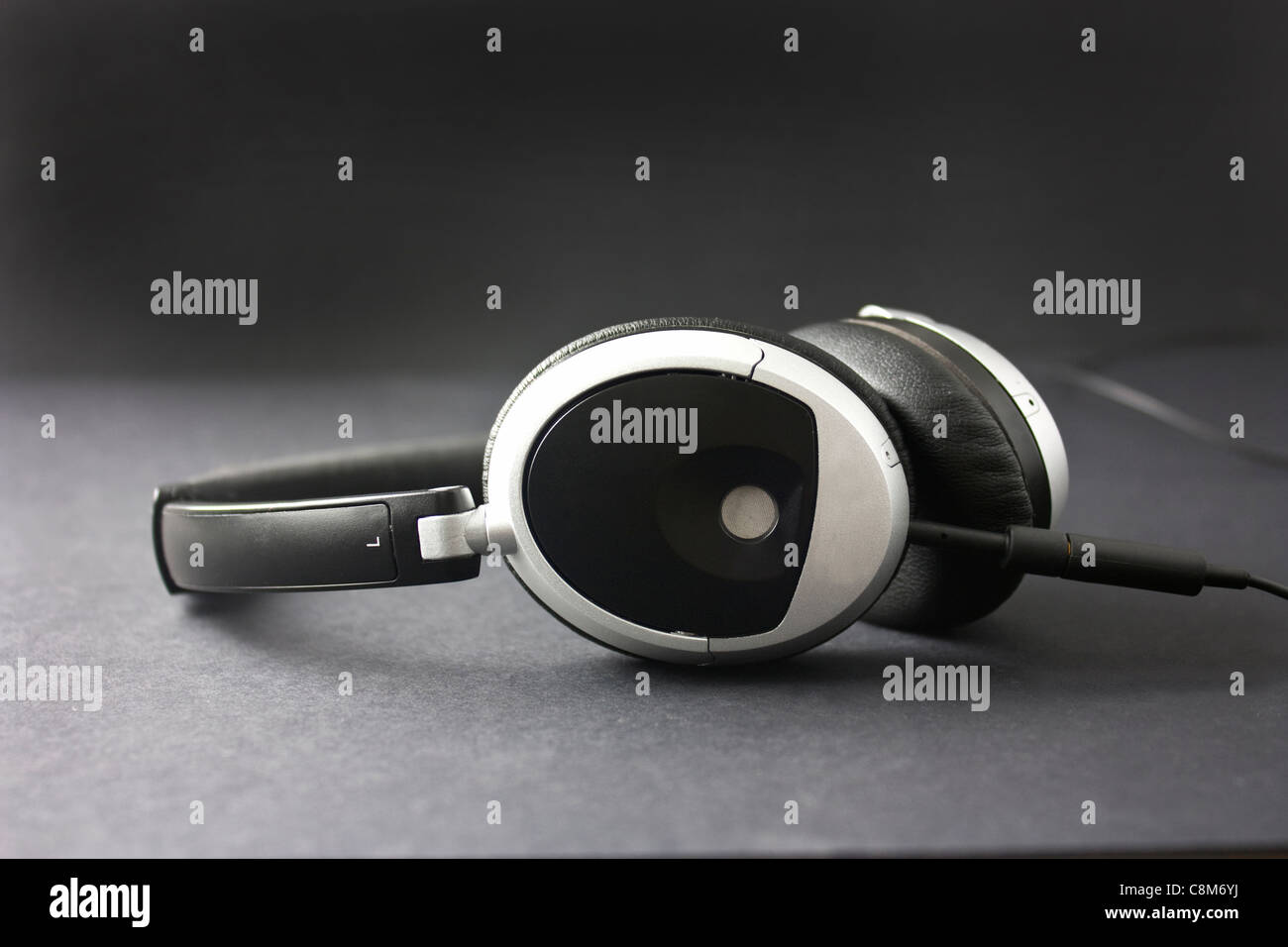 modern style headphones shot on a black background Stock Photo