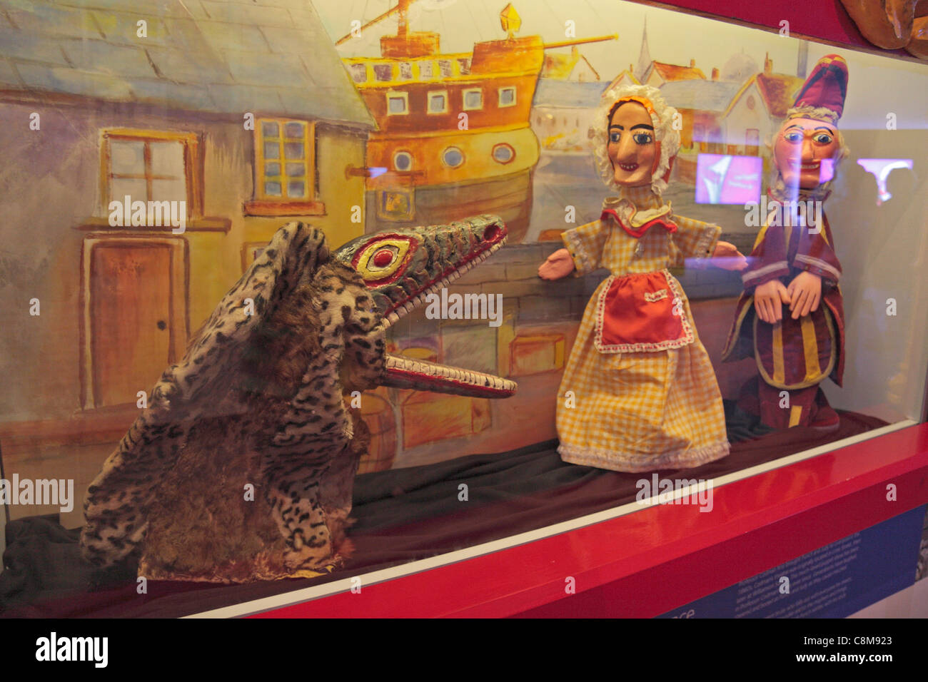 Display of Punch and Judy (and crocodile) puppets in the Museum of Liverpool on Pier Head, Liverpool, UK. Stock Photo