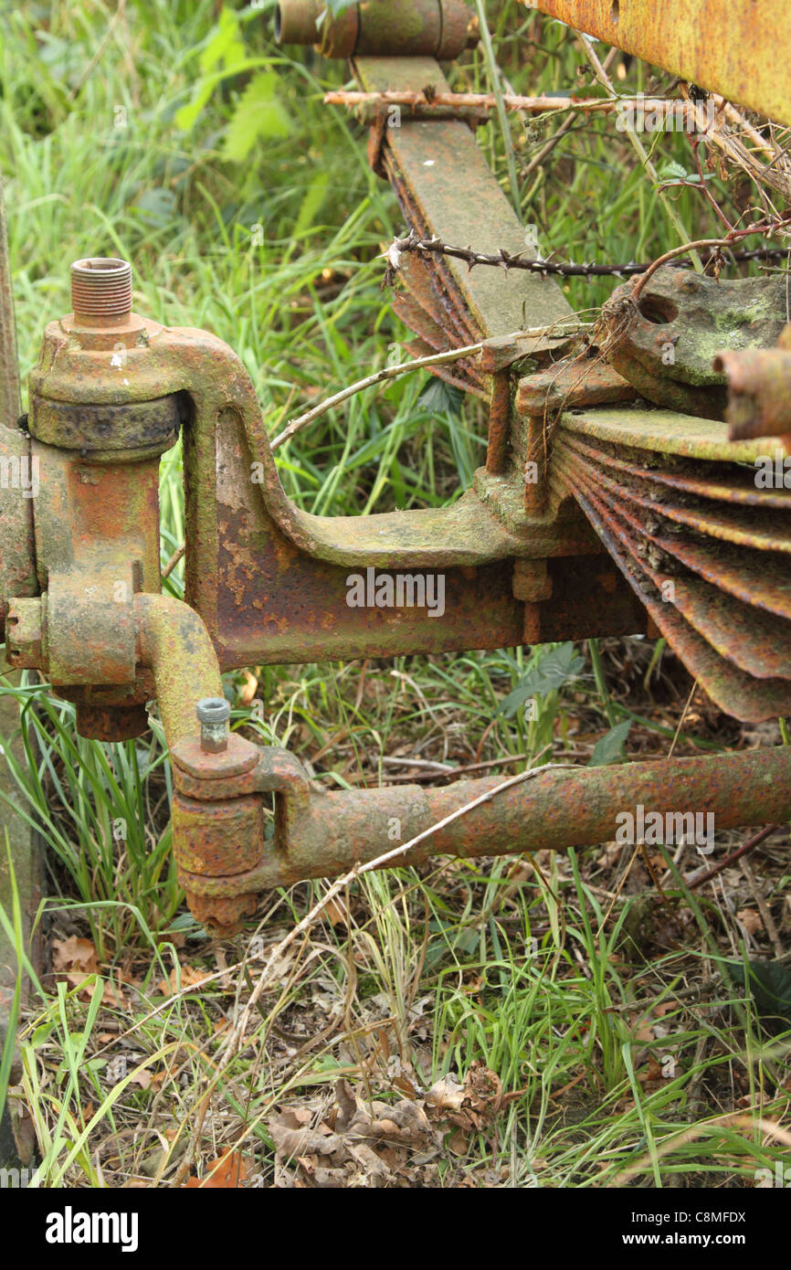 Image of rusty old trailer leaf spring suspension and steering