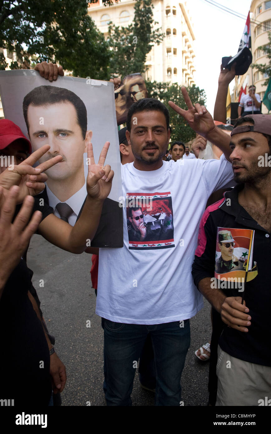 Supporters of the Syrian regime of Bashar Al-Assad during a demonstration in Hamra, west Beirut, Lebanon on 23.10.2011. Stock Photo