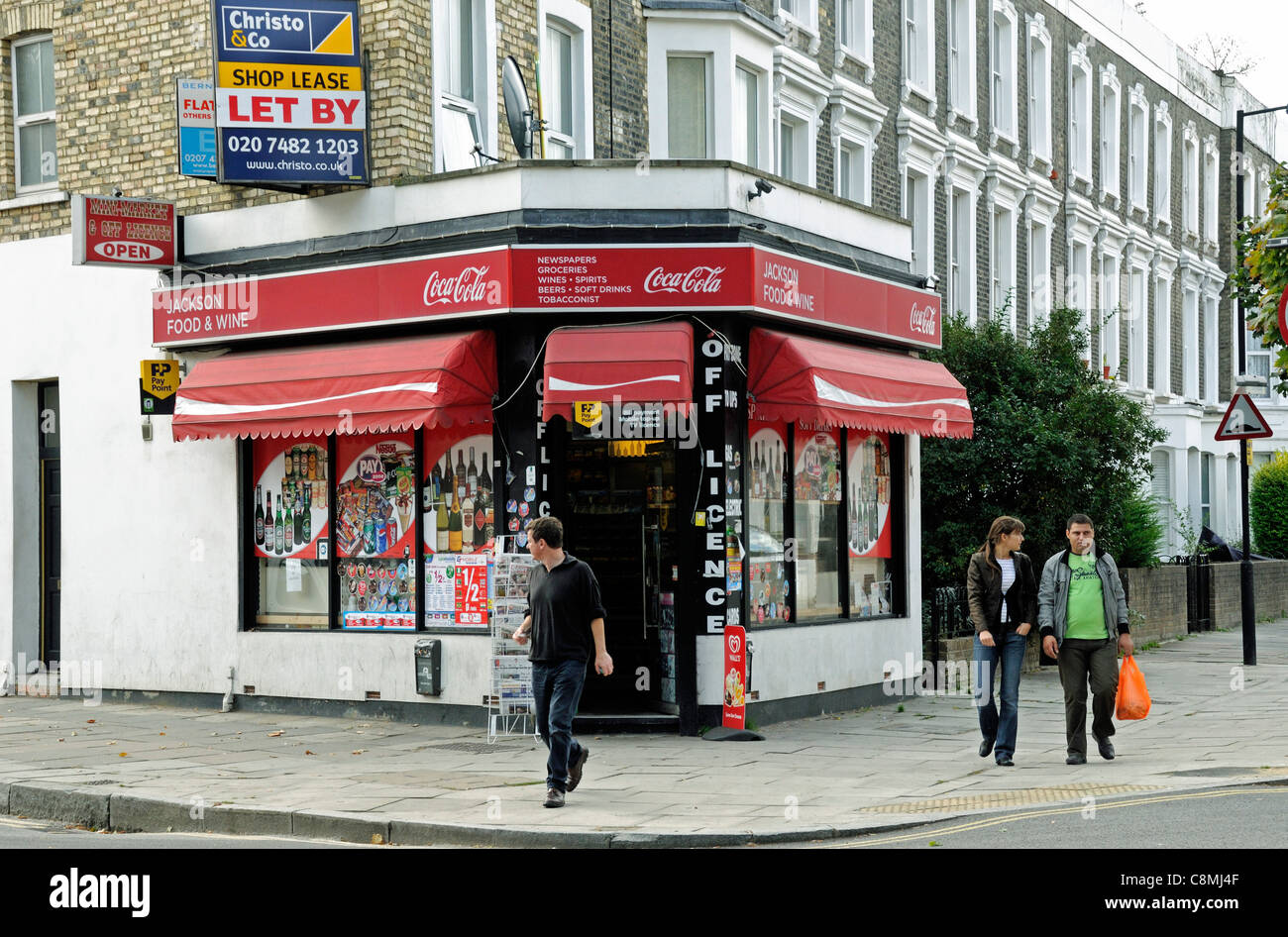 Corner shop with people outside Holloway London Borough of Islington