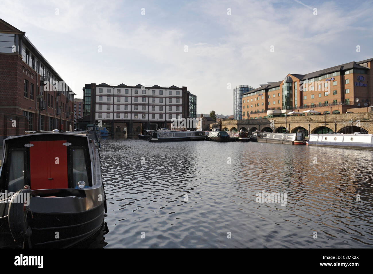 Victoria Quays in Sheffield England UK, with the Straddle warehouse in the distance, the Quays Hotel on the right Sheffield canal basin narrow boats Stock Photo