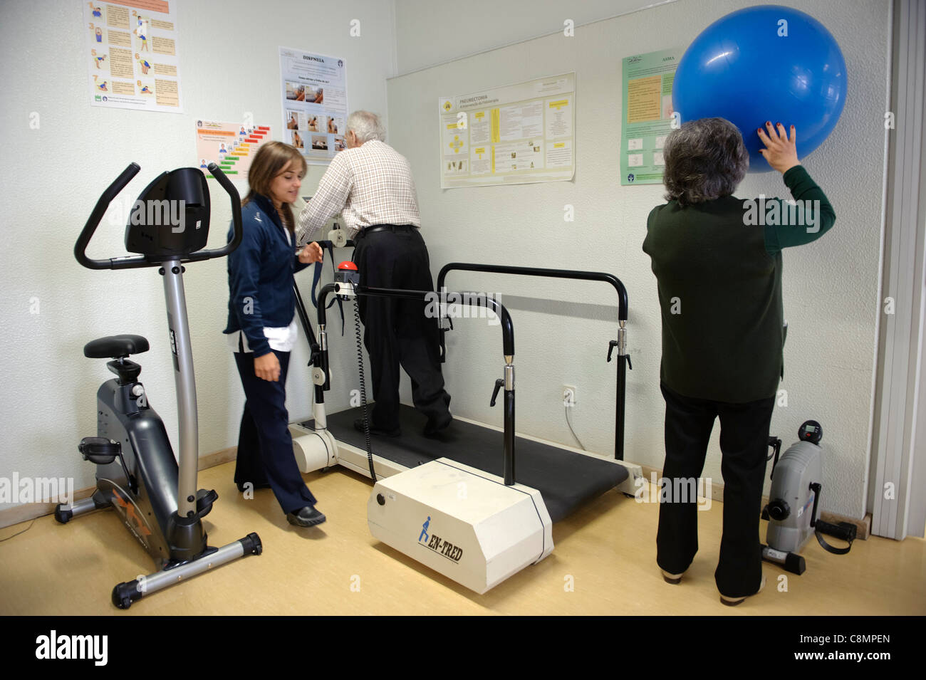 Elderly people exercising at hospital's physical rehabilitation gymn Stock Photo