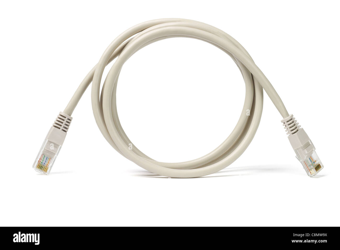 Close up of network cable and plugs on white background Stock Photo