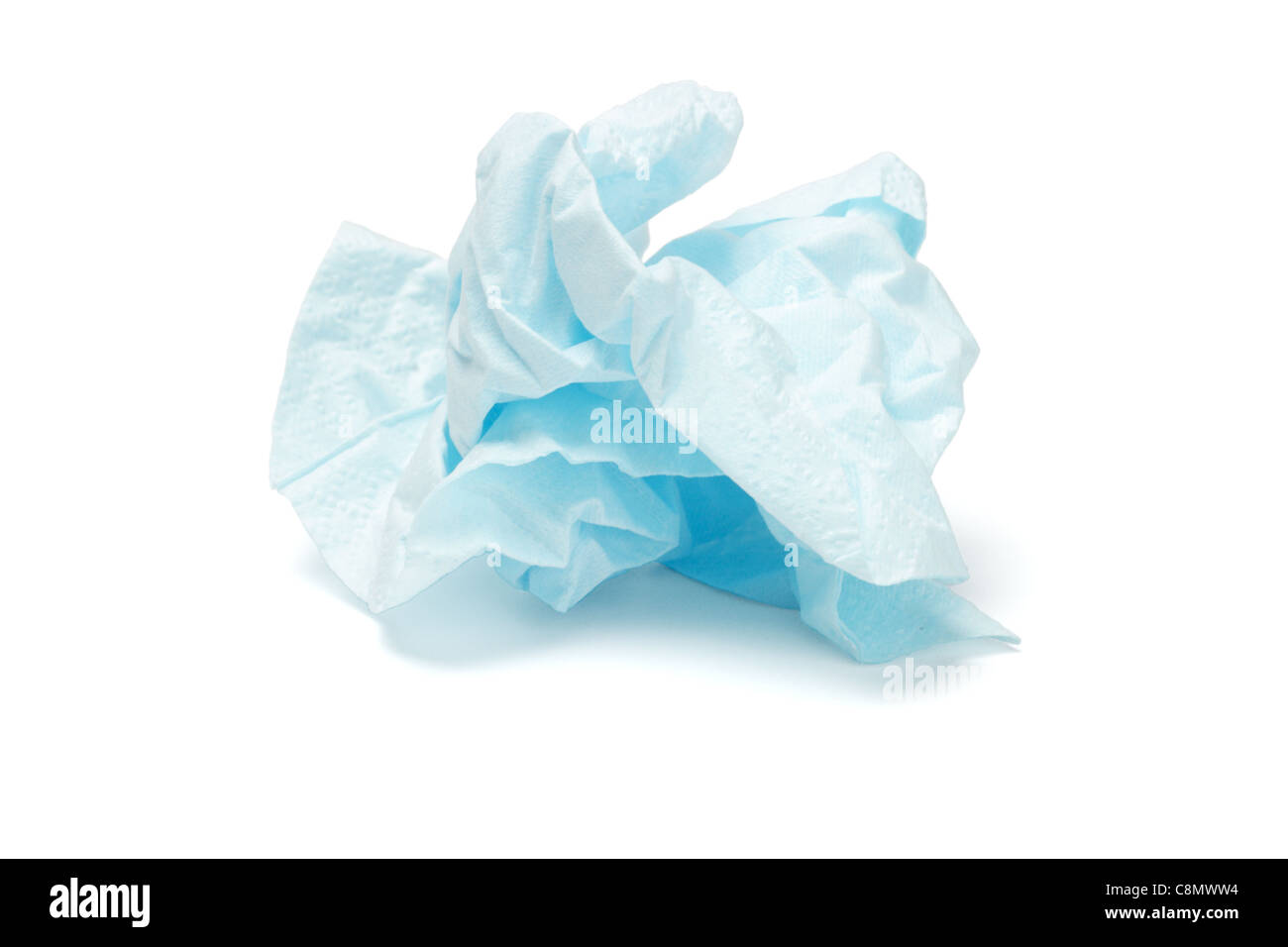Crumpled blue facial tissue paper on white background Stock Photo