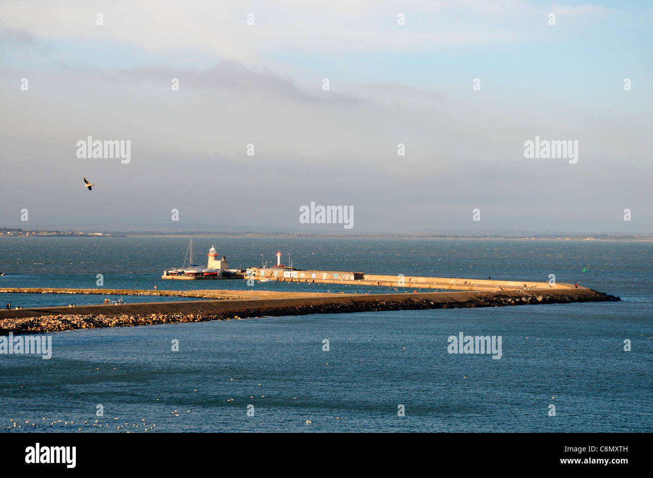 howth harbour harbor marina mooring county dublin bay irish sea ireland lighthouse pilot light Stock Photo