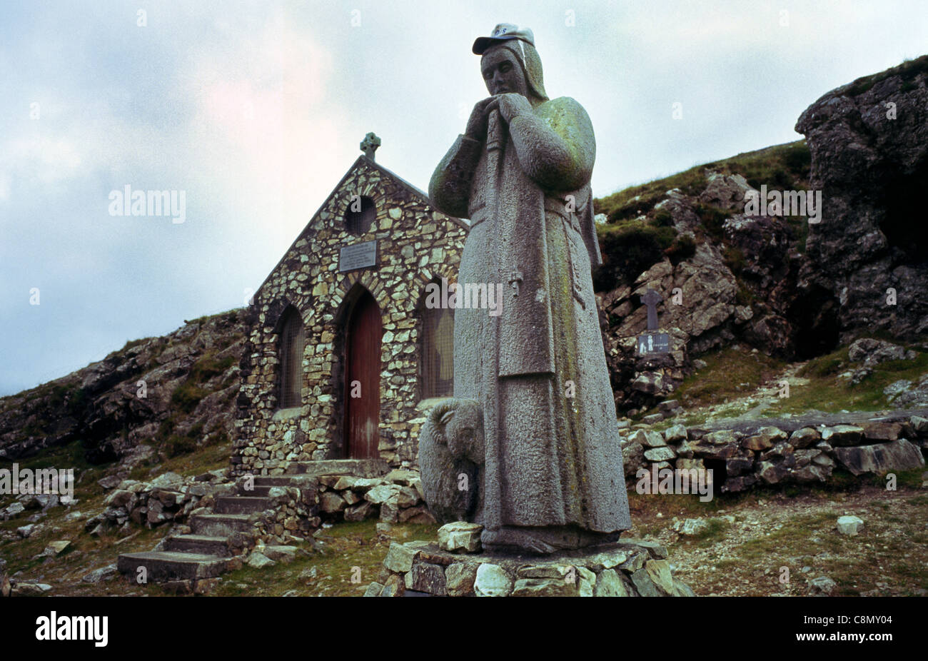 Statue of St Patrick Maam Ean Connemara National Park Maamturk Mountains County Galway Ireland Westernmost point of the journeys of St. Patrick 5th Century When St Patrick spent the night here, a well of holy water sprang Stock Photo
