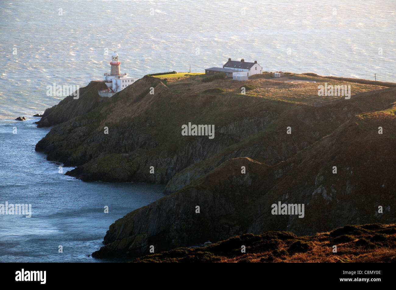 The Bailey Irish Lighthouse on howth head co Dublin overlooking Dublin Bay Stock Photo