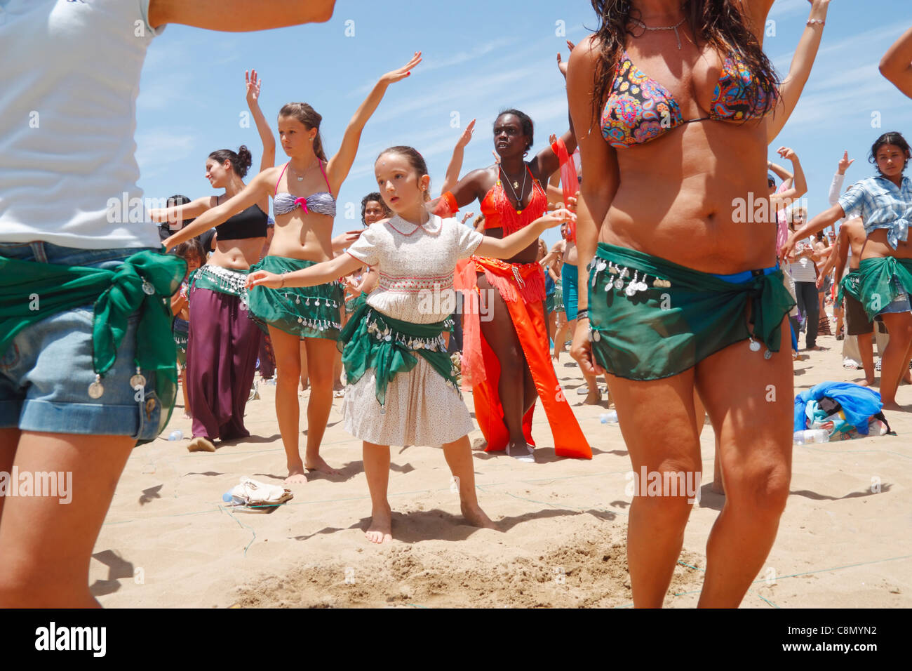 Belly dancers on Las Canteras beach in Las Palmas on Gran Canaria. Stock Photo