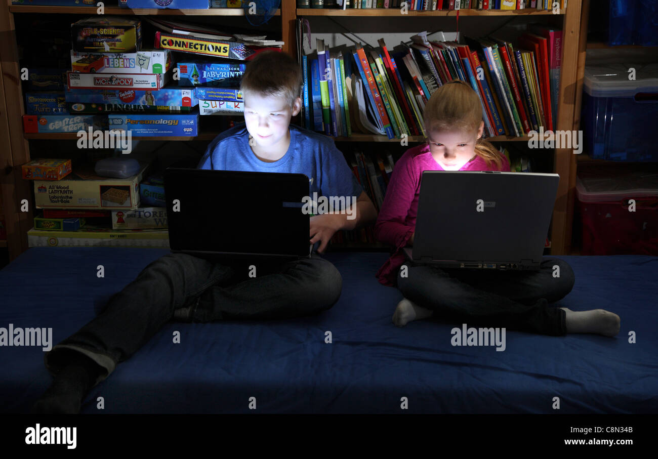 2 Kids Girl 10 Boy 13 Years Old Playing Computer Games On