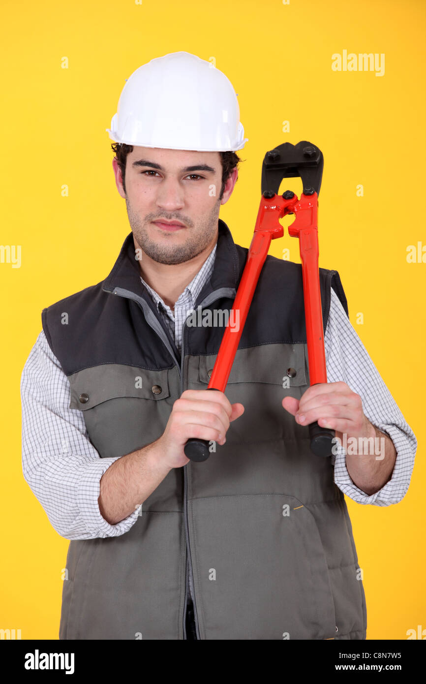 Man with pair of bolt cutters Stock Photo Alamy