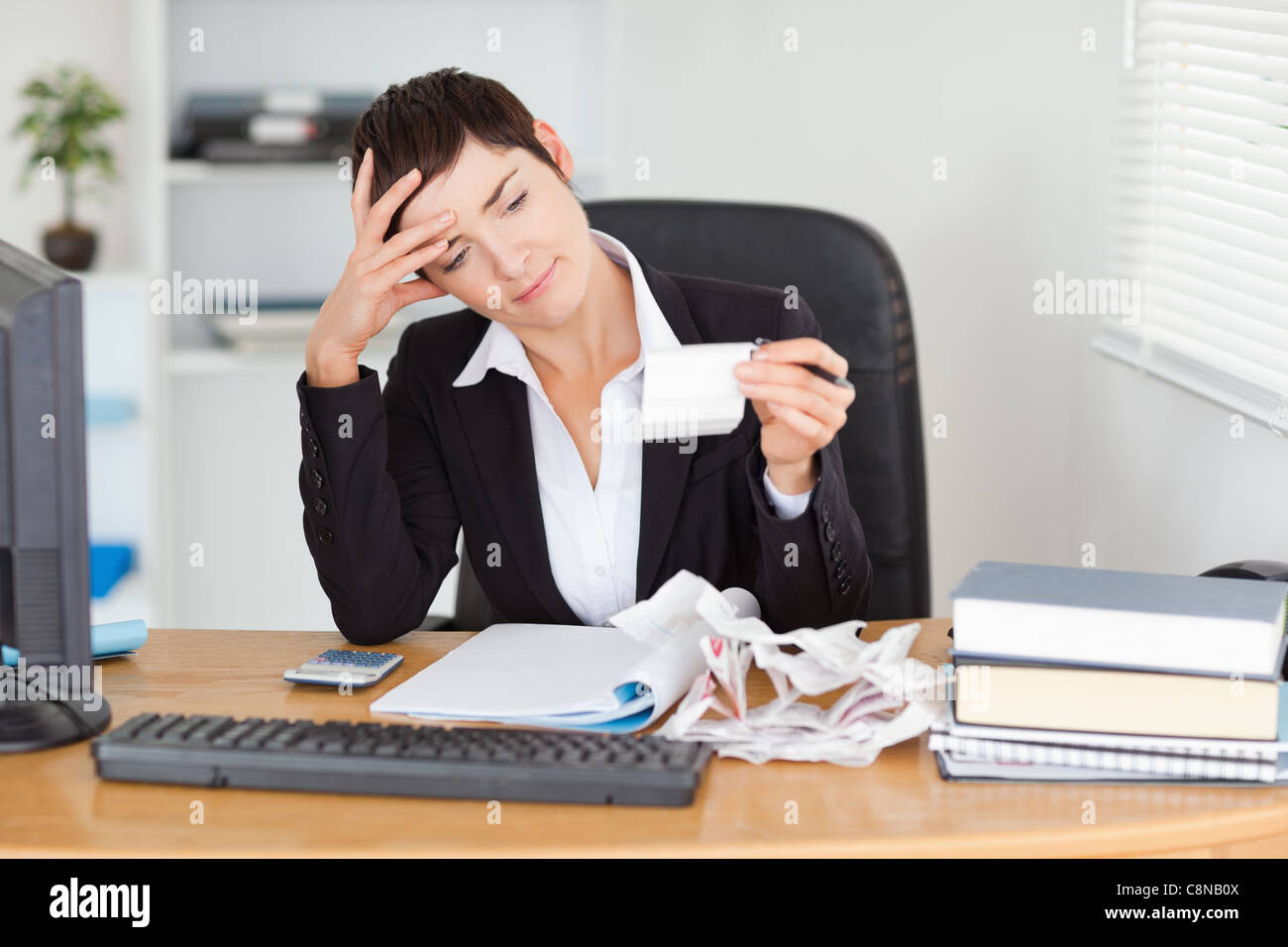 Accountant checking receipts Stock Photo