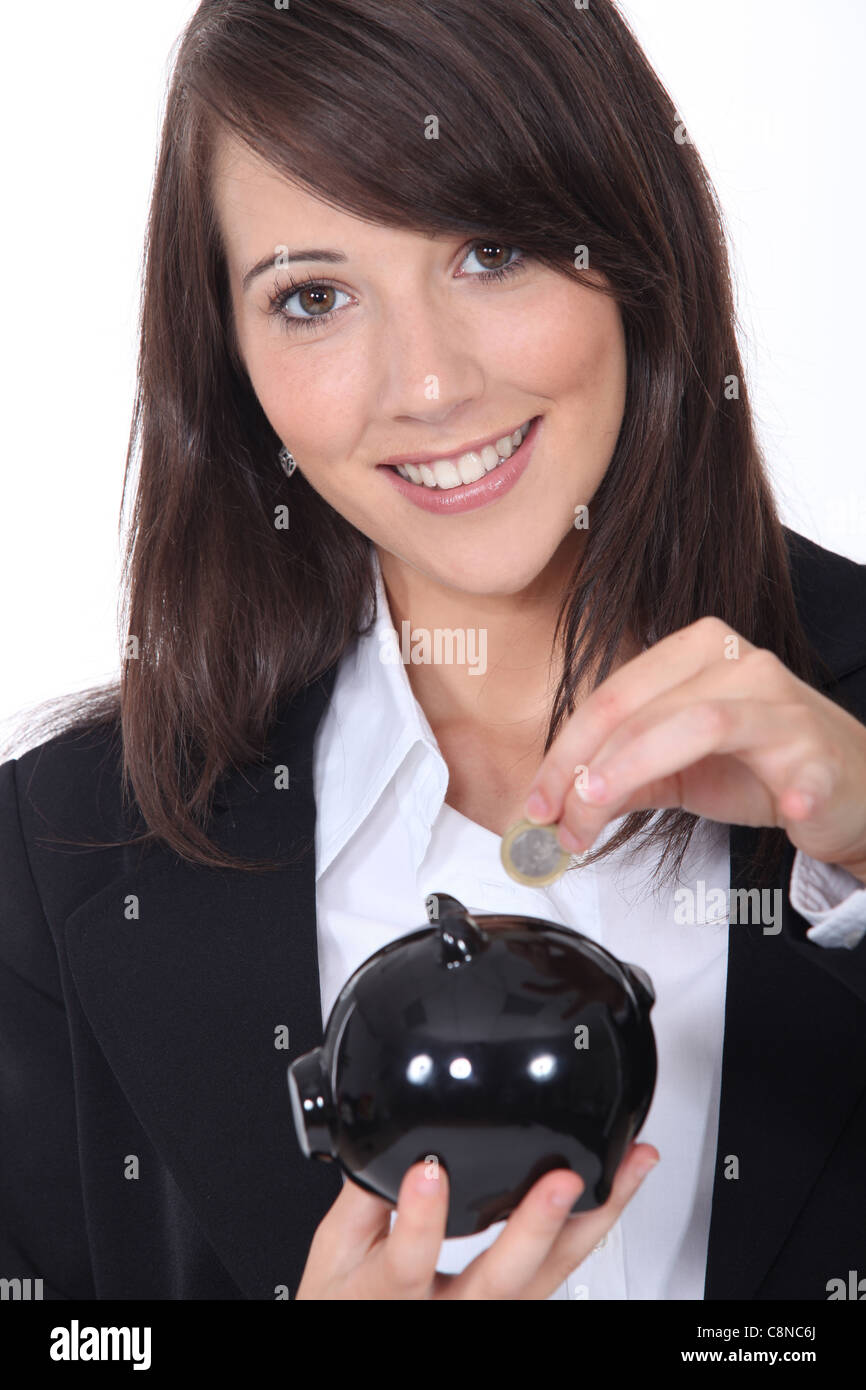Savings in a moneybox Stock Photo Alamy