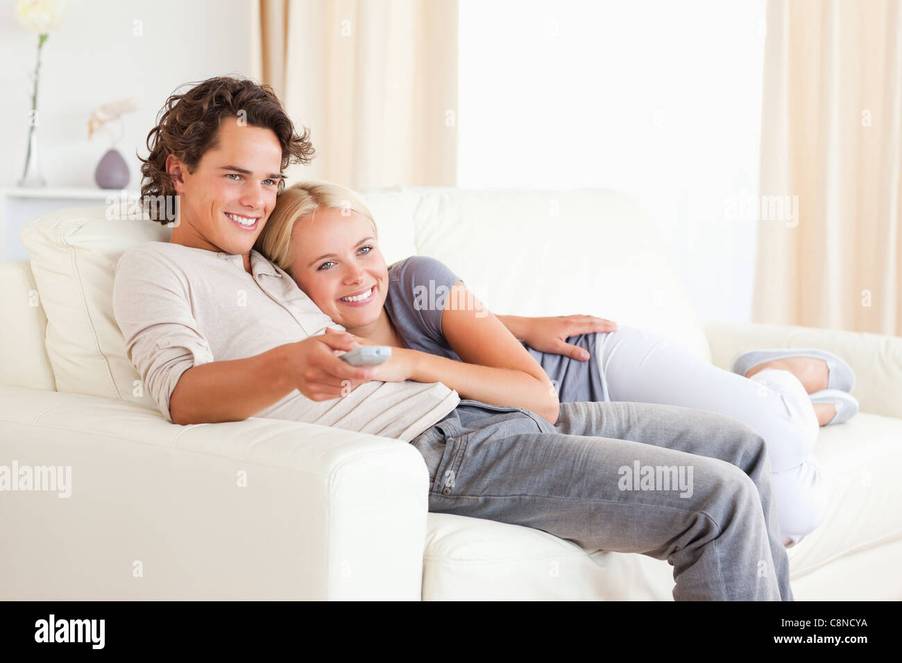 Couple Cuddling Watching Tv