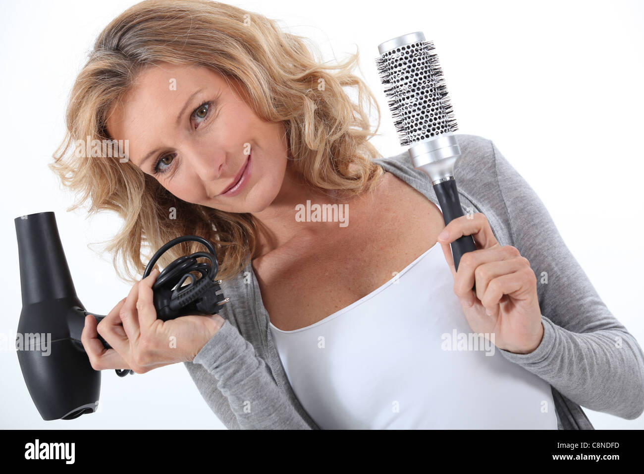 Hot air brush hair dryer hi-res stock photography and images - Alamy