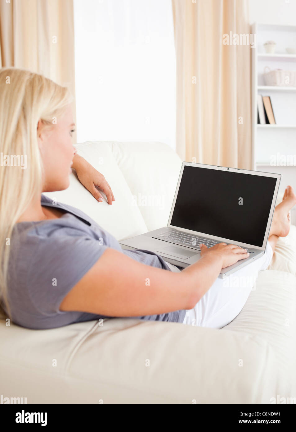 Switching On Their Computer Switching on a laptop computer hi-res stock photography and images - Alamy