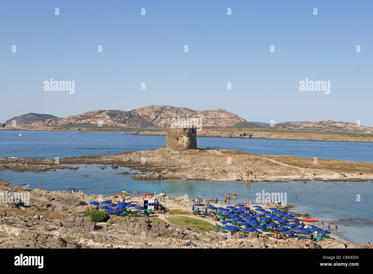 Italy, Sardinia, Spiaggia della Pelosa and Spanish fortification of Torre Pelosa Stock Photo