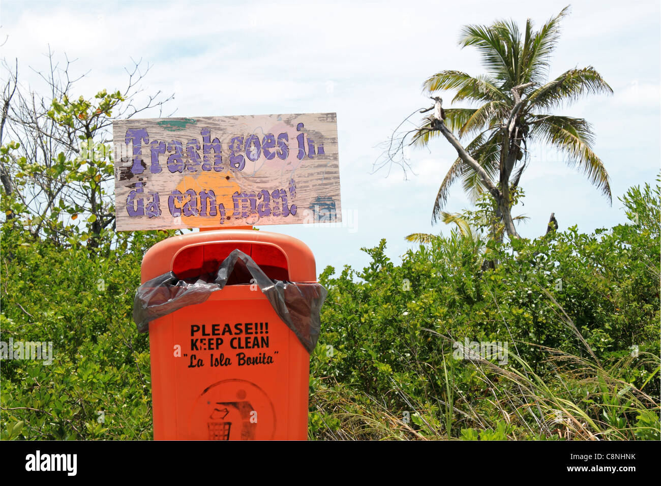 Trash can and sign San Pedro, Ambergris Caye (aka La Isla Bonita/The Beautiful Island), Barrier Reef, Belize, Caribbean, Central America Stock Photo